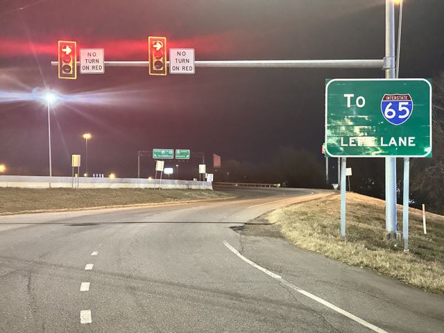 Left-turn signals with No Turn on Red signs at an interstate entrance