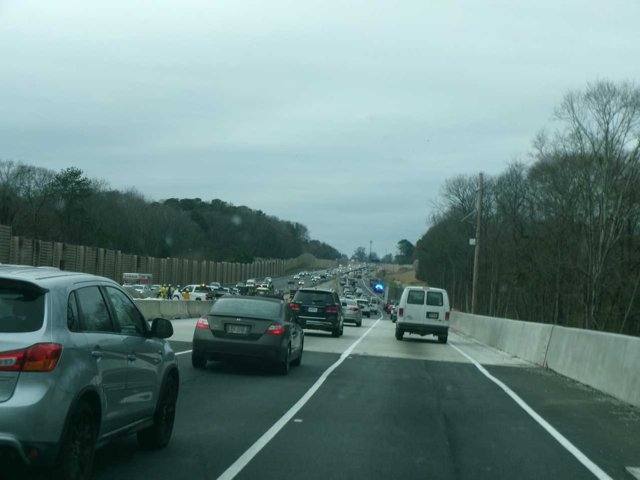 Westbound I-20 construction zone approaching an accident scene